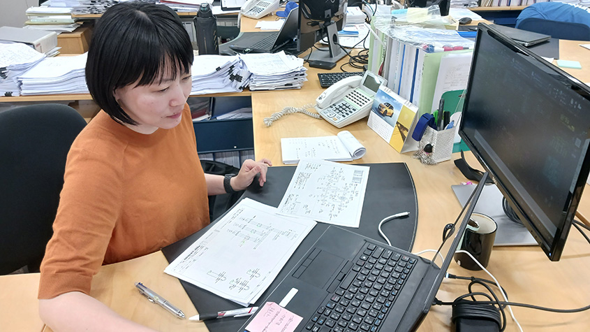 Yuki Fujimura at her office in Japan.jpg
